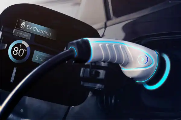 A close-up of an electric vehicle charging in Goshen NY, with the charging plug connected and a display showing 80% charge—perfect inspiration for your own electric car charging installation.